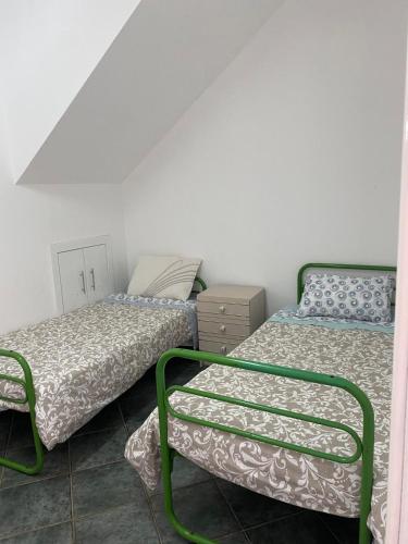 Postel nebo postele na pokoji v ubytování Casa d'Aldeia