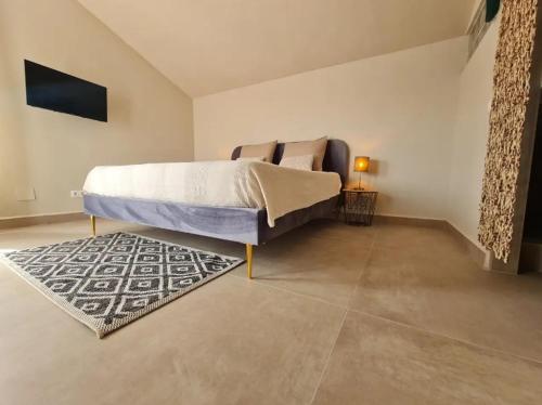 Ένα ή περισσότερα κρεβάτια σε δωμάτιο στο Casa La Jolla B&B