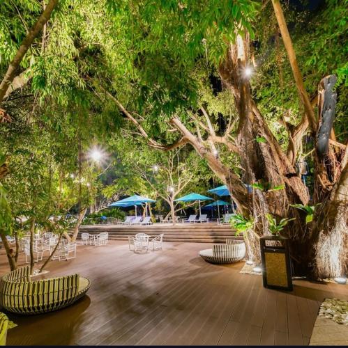 Un jardín fuera de Seaside serenity tambuli condo