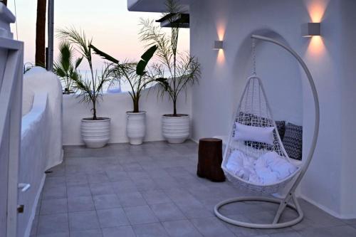 a room with a swing and potted plants at Rodhéa in Rhodes Town