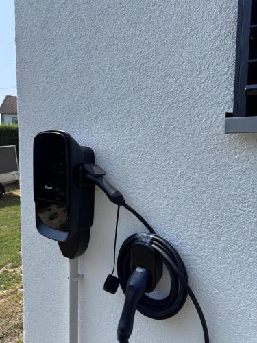 a phone is attached to the side of a building at Unger's Ferienwohnung in Isny im Allgäu