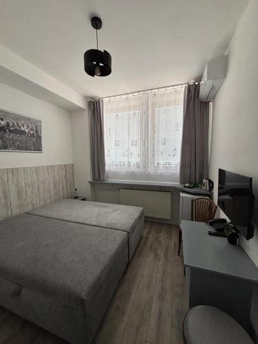 Postel nebo postele na pokoji v ubytování Hotel Avion