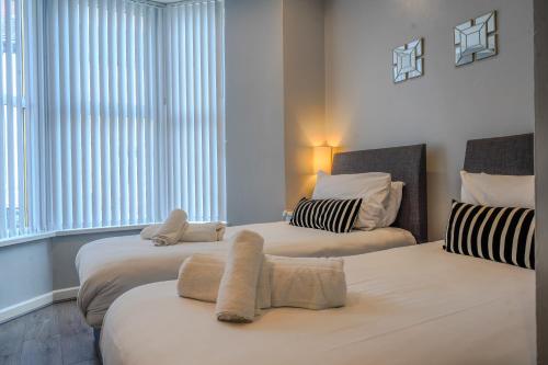 Ένα ή περισσότερα κρεβάτια σε δωμάτιο στο Stunning 1 Bedroom 4 Guest Flat by Anfield Stadium