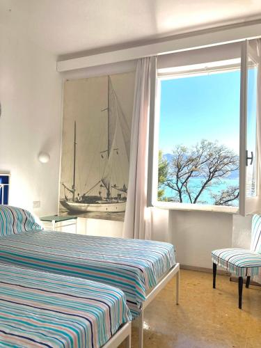 Postel nebo postele na pokoji v ubytování Villa With Private Sea Access In Portofino