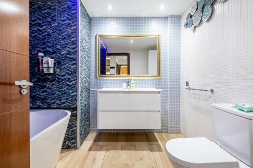 Ένα μπάνιο στο Sunset Palm Mar - Family Friendly Suites