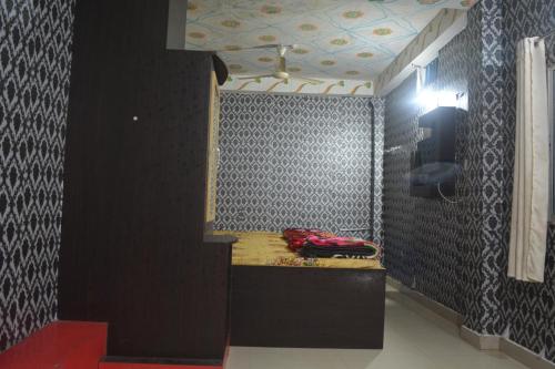 Una cama o camas en una habitación de Hotel Goura