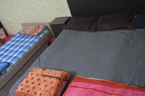 Una cama o camas en una habitación de Hotel Goura