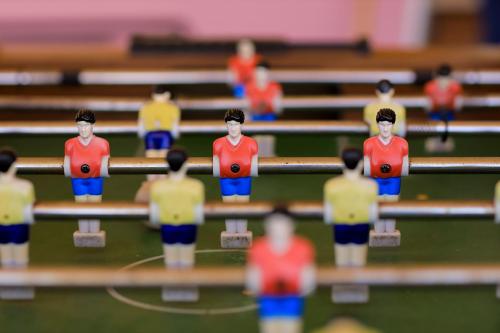 a group of toy men in a soccer match at Mantis Akagera Game Lodge in Akagera