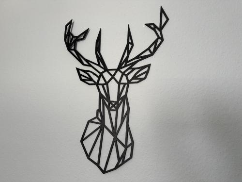 a drawing of a deer with antlers on a wall at Ferienwohnung "Apartment Sunlife Winterberg" 4 Sterne in Winterberg