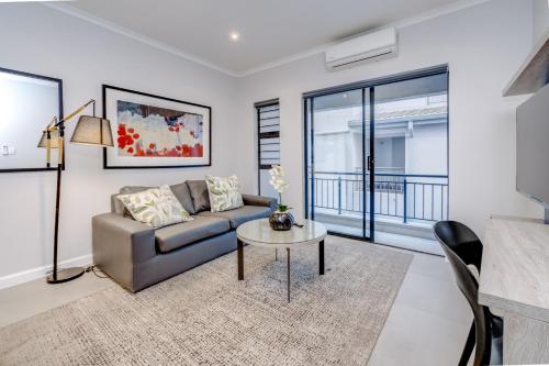 Χώρος καθιστικού στο Urban Oasis Apartments at 7 on Middle