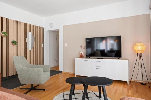 Μια τηλεόραση ή/και κέντρο ψυχαγωγίας στο Aurora Sauna Suite, waar rust comfort en een vleugje luxe samenkomen