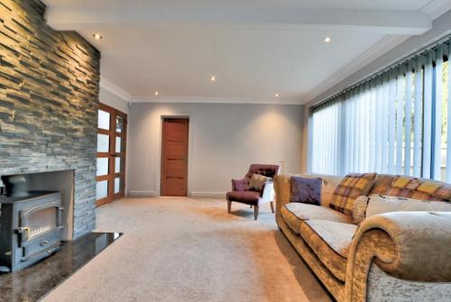 Χώρος καθιστικού στο Stunning large house in Green Dunmow