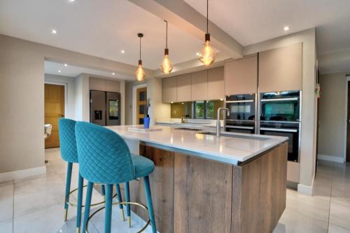 Η κουζίνα ή μικρή κουζίνα στο Stunning large house in Green Dunmow