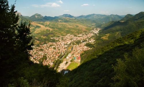 a view of a city from a mountain at Семеен Хотел Вит in Teteven