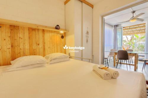 Postel nebo postele na pokoji v ubytování Kozy Corallines 35m2 - La Saline-les-Bains