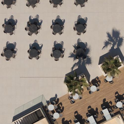 an overhead view of tables and chairs in a building at Fodele Beach Water Park Resort in Fodele