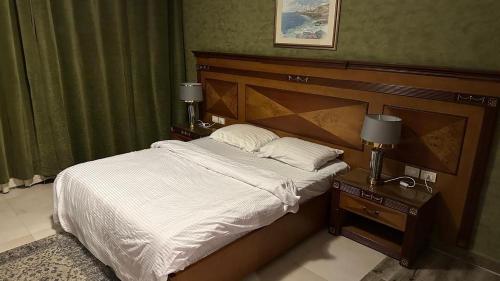 Postel nebo postele na pokoji v ubytování Delta n1 Sharm