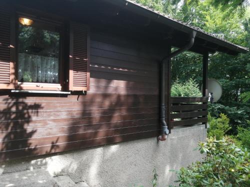 a window on the side of a house at Ferienhaus am Waxeneck in Feichtenbach