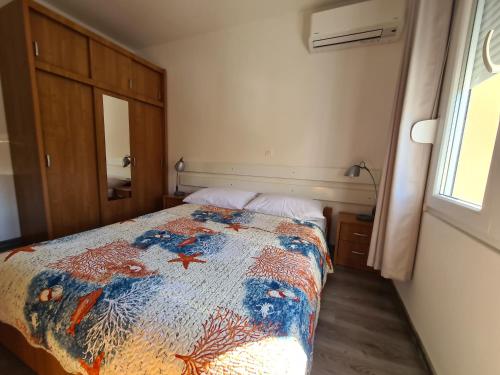 Postel nebo postele na pokoji v ubytování Apartmani Magaš
