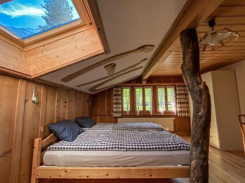 Postel nebo postele na pokoji v ubytování Ferienhaus Chalet Simeli