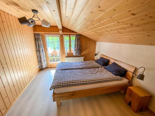 Postel nebo postele na pokoji v ubytování Ferienhaus Chalet Simeli