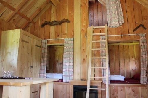 Postel nebo postele na pokoji v ubytování Houtlodge 18 persons