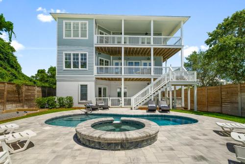 a large house with a swimming pool and a building at Paradiso Del Mare by Stay on 30A, Gulf View- Private Pool! in Inlet Beach