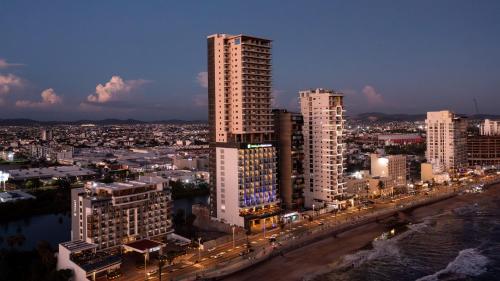 a view of a city with tall buildings at Holiday Inn Express & Suites Mazatlan by IHG in Mazatlán