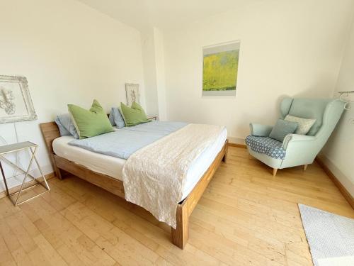Postel nebo postele na pokoji v ubytování Gästehaus Sonne