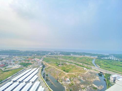an aerial view of a city and a river at Tokyo River side PIK2 By Micky Studio 4 in Muara