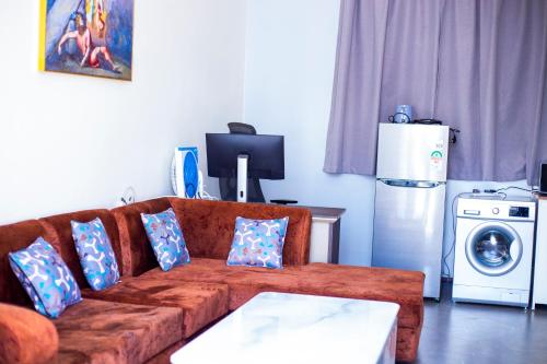 Ein Sitzbereich in der Unterkunft Spea Apartments