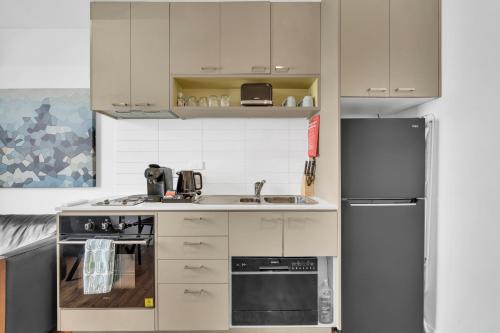 Η κουζίνα ή μικρή κουζίνα στο Grosvenor 3121 Richmond