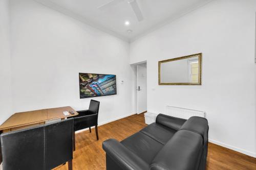 Μια τηλεόραση ή/και κέντρο ψυχαγωγίας στο Grosvenor 3121 Richmond