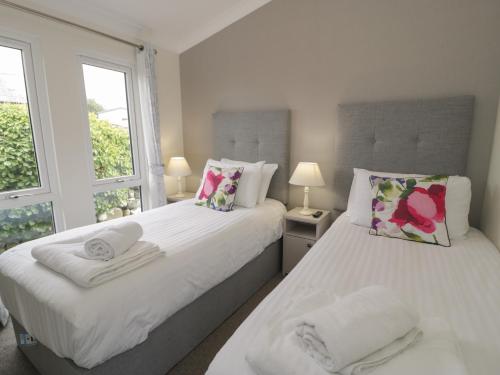 Postel nebo postele na pokoji v ubytování Platinum Lodge 503