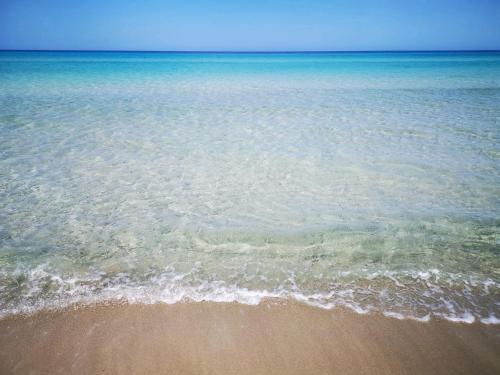 a view of the ocean from the beach at Residence Pantelleria Apparts in Kelibia