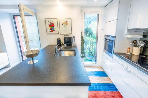 a kitchen with a sink and a counter top at Dongio, Acquarossa in Dongio