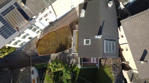an overhead view of a house with plants on it at Dongio, Acquarossa in Dongio