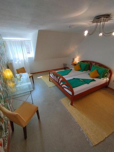 a bedroom with a large bed in a room at Ferienwohnung Moselherz in Reil