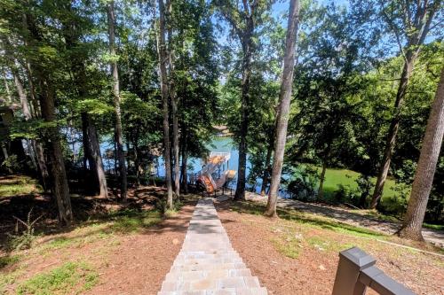 a path in a park with trees at Beechwood Cove in Moneta