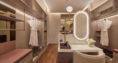 a bathroom with a sink and a mirror at InterContinental Bangkok Sukhumvit by IHG in Bangkok