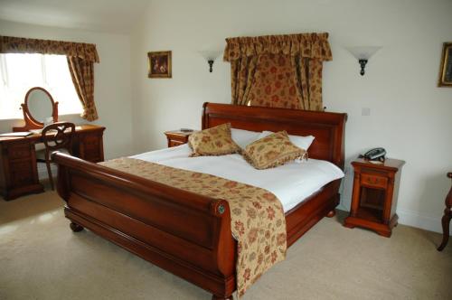 Ένα ή περισσότερα κρεβάτια σε δωμάτιο στο The Down Inn