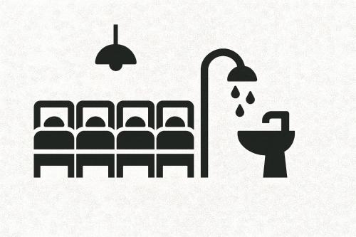 a bathroom with chairs and a toilet and lights at Berghaus Grünsee in Zermatt