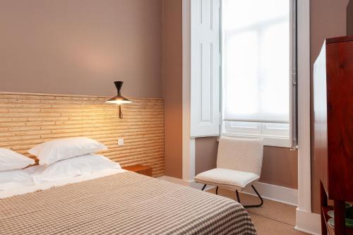 Katil atau katil-katil dalam bilik di Lisbon Cheese & Wine Suites