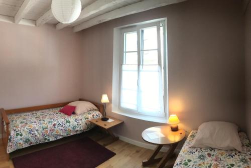 Llit o llits en una habitació de La Valentine
