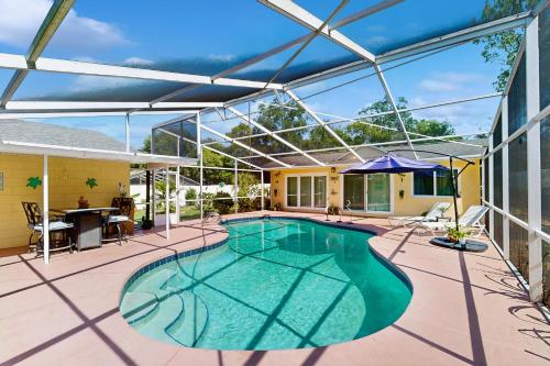 an image of a swimming pool on a patio at Pool Access! Dog-Friendly Retreat 16 Mi to Orlando in Orlando