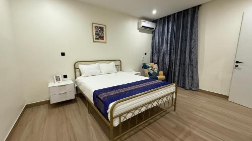 Ένα ή περισσότερα κρεβάτια σε δωμάτιο στο Point E- University of Dakar