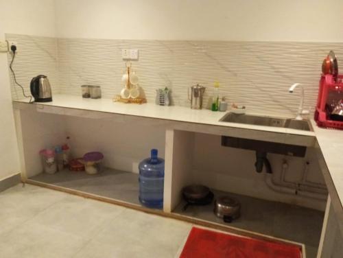 Η κουζίνα ή μικρή κουζίνα στο Kamala villa