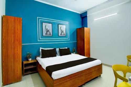 Postel nebo postele na pokoji v ubytování Hotel O SS