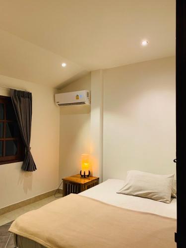 Ένα ή περισσότερα κρεβάτια σε δωμάτιο στο Scan House Apartment