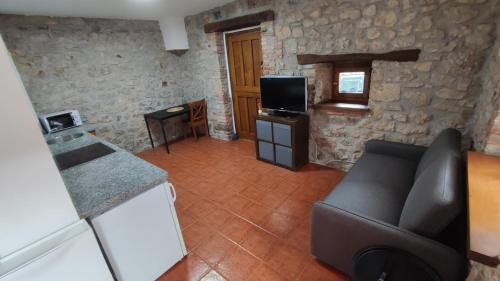 โทรทัศน์และ/หรือระบบความบันเทิงของ Apartamentos La Soleyera